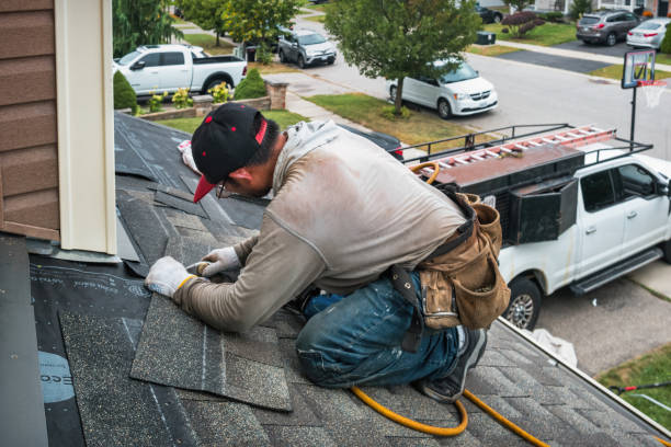 Professional Roofing technician working in Saint John, IN